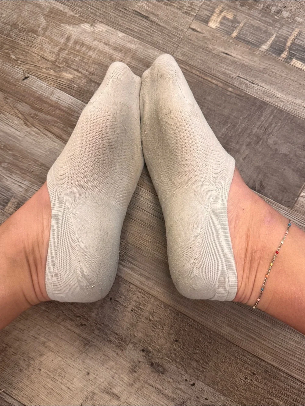 Well worn UA athletic gym socks